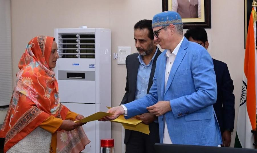 CM Omar Abdullah hands over regularisation orders to CPWs of School Education Department